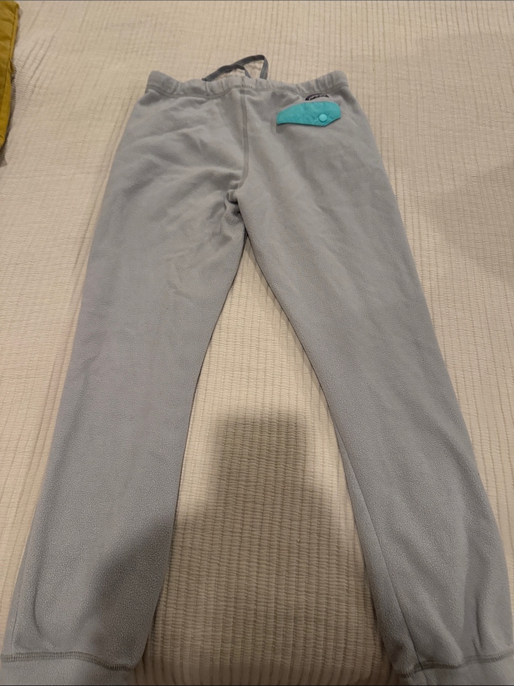 Kids Patagonia Light Gray Fleece Bottoms with Teal Accent